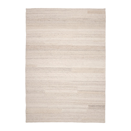 Alfombra BRÖNDEN. Beige neutro, rectangular, mezcla de lana y algodón tejida. Diseño texturizado y artesanal.