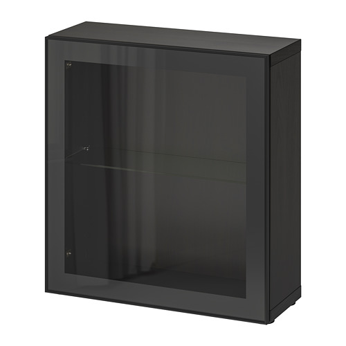A sleek black BESTÅ storage unit featuring a glass door with a metal frame and tempered glass shelves for modern organizing.