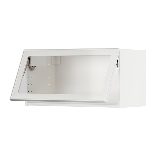 Mueble de pared de cocina METOD blanco con puerta de cristal y marco metálico.