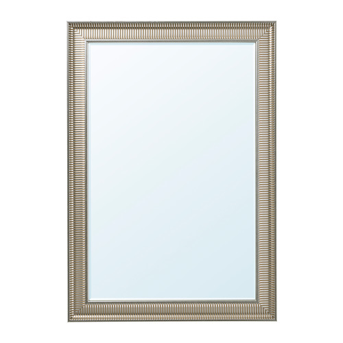 A vertical mirror named SONGE with a silver frame, featuring an ornate, textured design.
