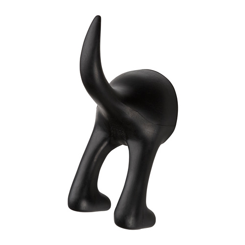 Un gancho de goma BÄSTIS negro, con forma de trasero de perro juguetón, ideal para colgar y organizar objetos de forma divertida y decorativa.