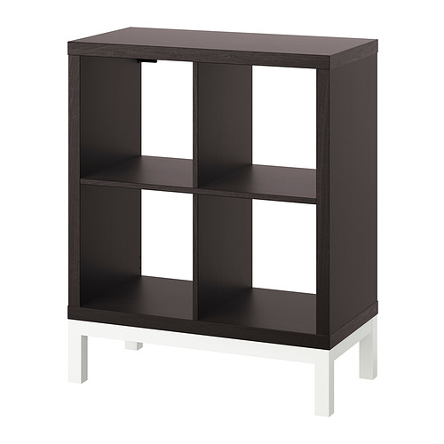 KALLAX black cube storage unit. Four open compartments. White legs. Modern, minimalist design.