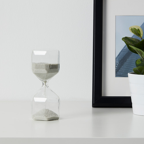 Reloj de arena, planta, cuadro