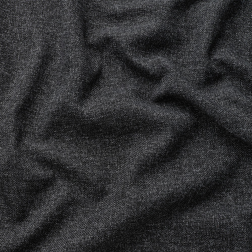 Tejido negro texturizado con sutil efecto jaspeado, tacto suave pero duradero.