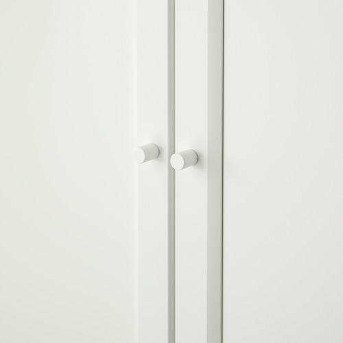 Mueble blanco minimalista con dos pomos redondos; Diseño elegante y moderno.