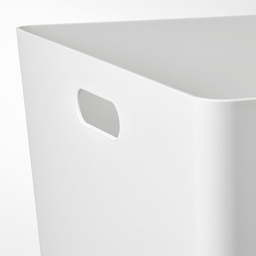 Cubo de almacenamiento blanco con asas incorporadas, superficie lisa, diseño sencillo.