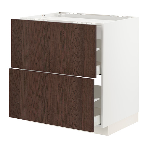 Un mueble de cocina METOD blanco con cajones de madera marrón oscuro, con un diseño elegante y moderno.