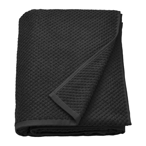 Black GULVIAL cotton towel, folded, soft and fluffy, thick, rectangular shape with textured design.