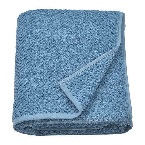 A folded light blue GULVIAL towel, soft and fluffy, made of 100% cotton, neatly folded with a smooth edge design.
