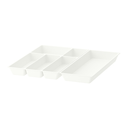 Tres organizadores de plástico blanco de la serie UPPDATERA, con forma de cajones maximera, diseñados para adaptarse a cajones de 60 cm de ancho.
