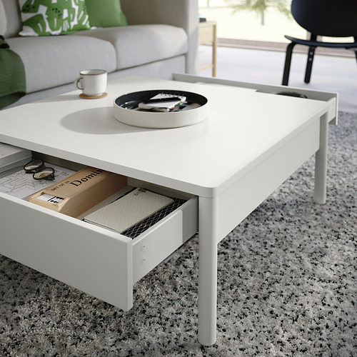 Mesa de centro en color blanco roto, serie TONSTAD, con dos cajones de cierre suave, diseño moderno.