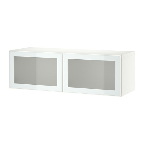 Un mueble de almacenaje blanco BESTÅ con puertas de cristal esmerilado, de diseño rectangular y moderno.