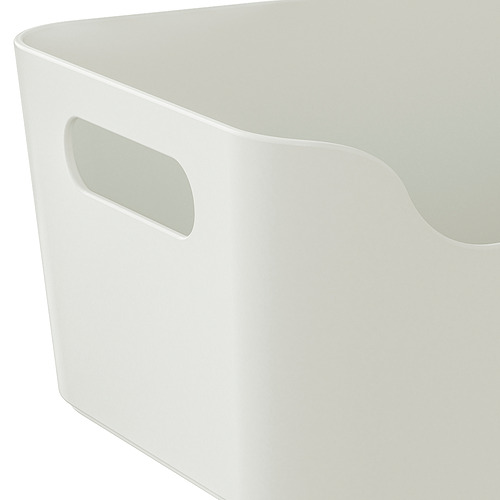 Caja de almacenamiento blanca con asas recortadas; acabado liso, esquinas redondeadas; Diseñado para un fácil acceso y transporte.