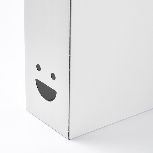 Elegante y minimalista archivo de revista con un diseño sonriente, elaborado con cartón reciclado.