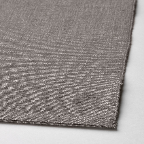 Primer plano de mantel individual gris tejido, que muestra una textura y artesanía de alta calidad.