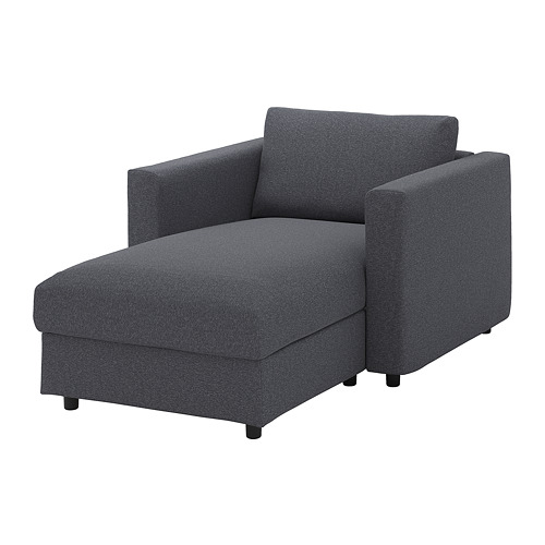 Silla VIMLE gris oscuro, de diseño moderno con tejido suave, respaldo y reposabrazos angulados.