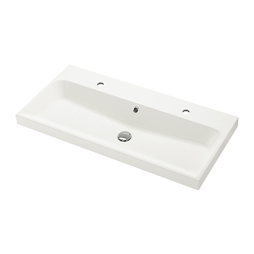 Un fregadero BACKSJÖN blanco y rectangular con un diseño moderno, hecho de mármol triturado, diseñado para un aspecto elegante.