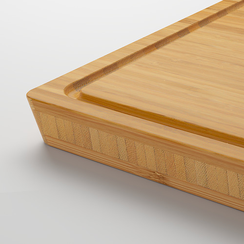 Tabla de cortar cuadrada de bambú con ranura fresada para la recolección de jugo, bordes inclinados para agarre.