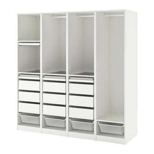 Un armario blanco PAX de ikea, con estantes y cajones para almacenamiento.