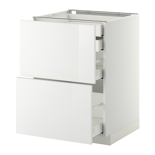 A white METOD kitchen cabinet with high gloss drawers.