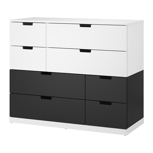 Modern two-tone black and white dresser with six drawers of different sizes.