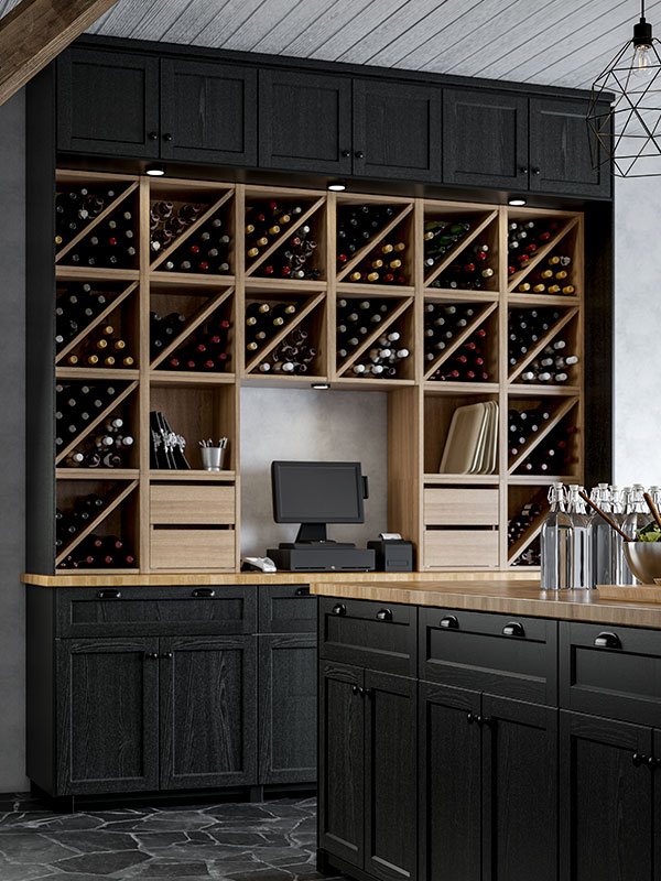 A kitchen with several VADHOLMA wine racks and an EKET shelving unit.