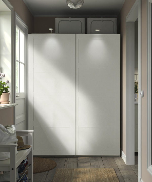a wardrobe with hinged doors