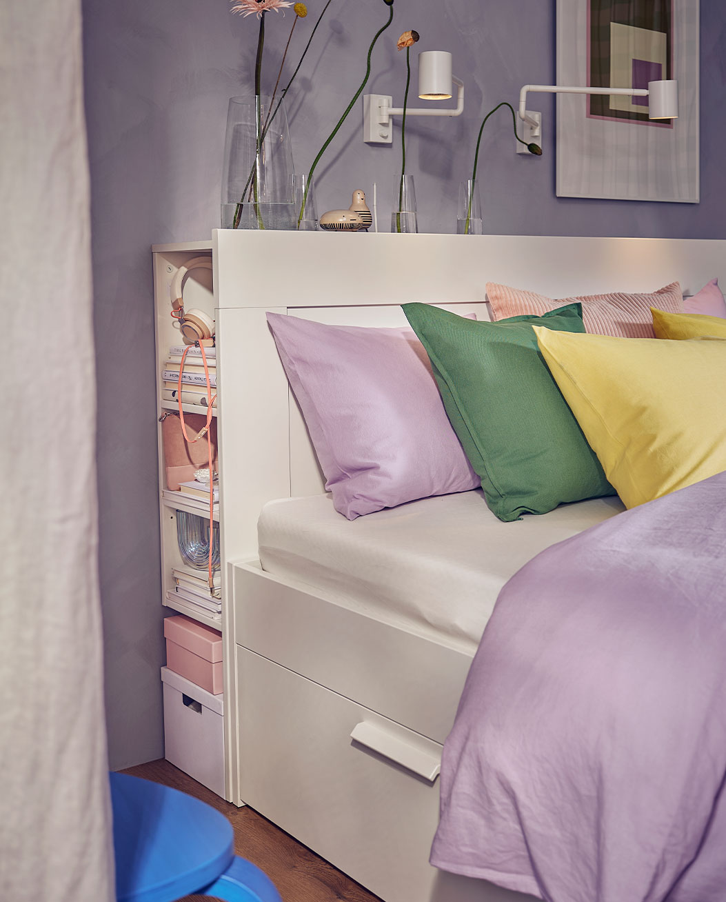 Colorful bedroom, a large bed with brightly colored cushions