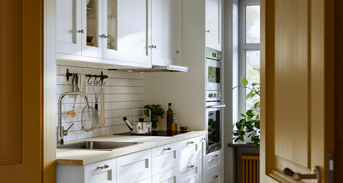 Kitchen with ENKÖPING cabinet fronts, PINNARP countertop, MATTRADITION convection oven, and ENERYDA handles.