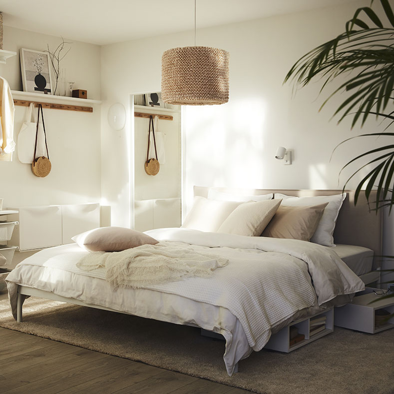 bedroom ready for summer. Lighter textiles, soft colors and pastel tones