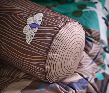 Cushion, cylinder shaped/brown