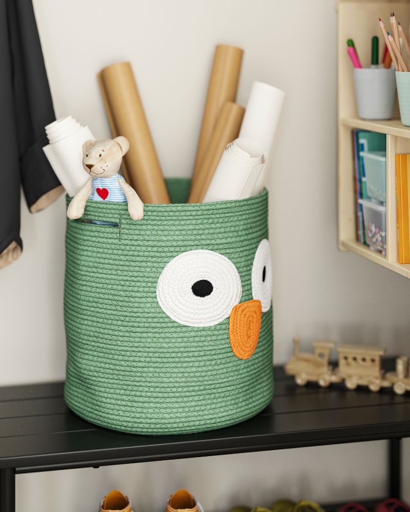 Cute owl-shaped storage basket for crafts & toys, with a small teddy bear friend.