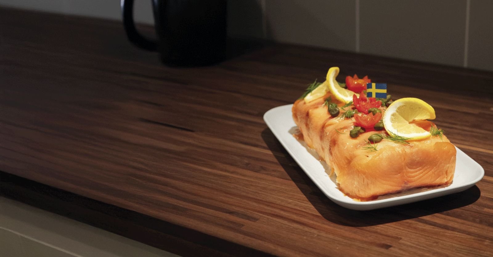 Smörgåstårta, a savory Swedish sandwich cake made with layers of bread and creamy fillings