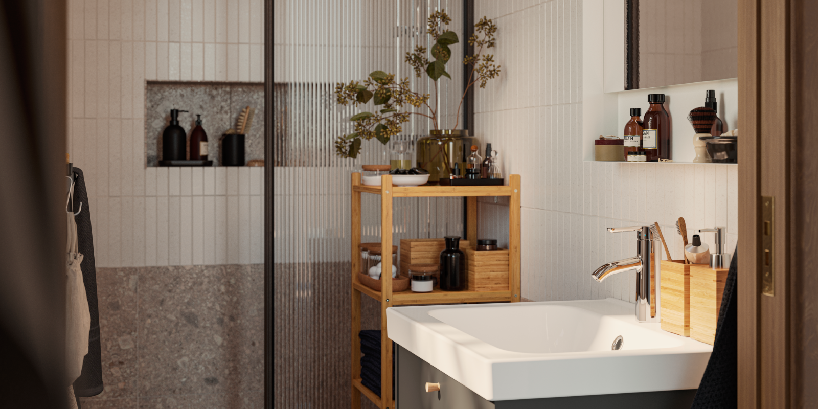 Modern bathroom with a glass shower enclosure: wooden shelf with a glass vase and artificial flowers, a washbasin and a square mirror with LED lighting. An elegant, minimalist design.