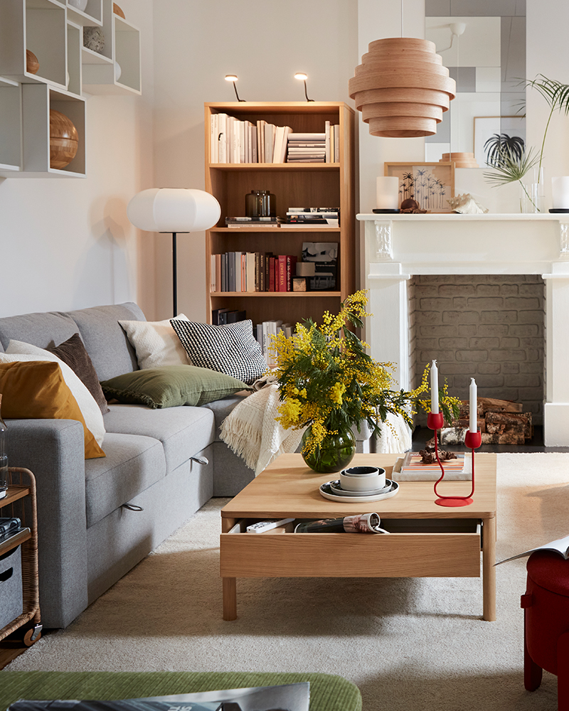 Warm and bright living room with wooden furniture and natural textiles.