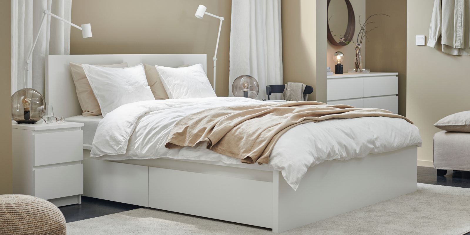 Cozy bedroom with MALM queen bed, ÄNGSLILJA duvet set, STOCKHOLM mirror, STORKLINTA nightstand and dresser.