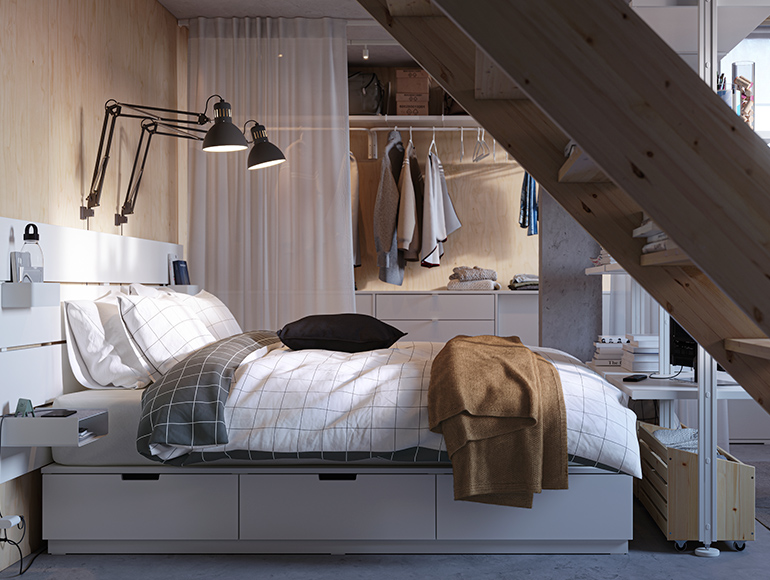 A small bedroom in a rented studio with a minimal aesthetic