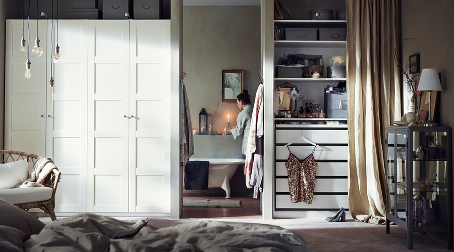 White wardrobes in a bedroom.